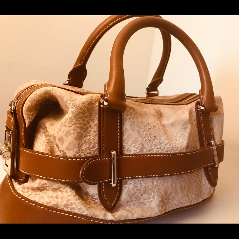 Leather and fabric handbag